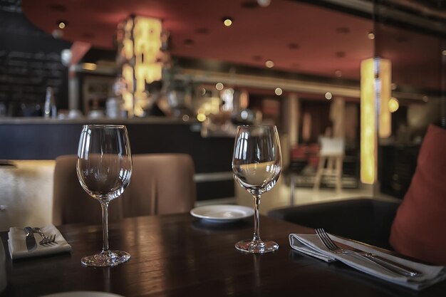 fork and knife serving in the interior of the restaurant / table in a cafe, food industry catering, menu