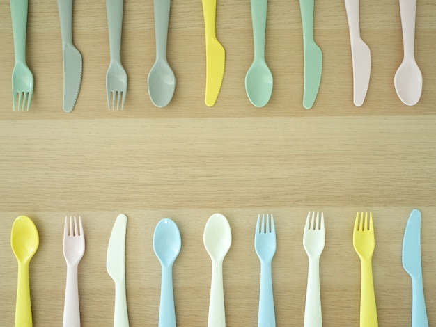 Fork knife spoon colorful on wooden