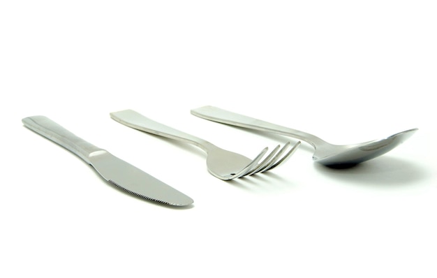 Fork, spoon and knife isolated on white background