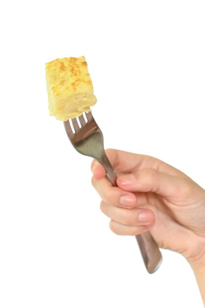 Fork with piece of Spanish tortilla isolated on white background, selective focus and copy space.