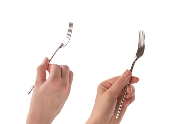 fork in woman hand isolated on white