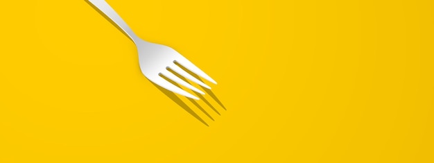 Fork on a yellow background