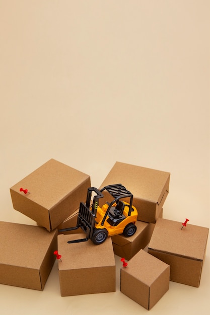 Photo forklift and boxes supply chain concept