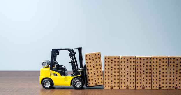 Forklift builds apartment residential buildings Construction industry Providing housing infrastructure for growing communities Progress and development New housing options become available