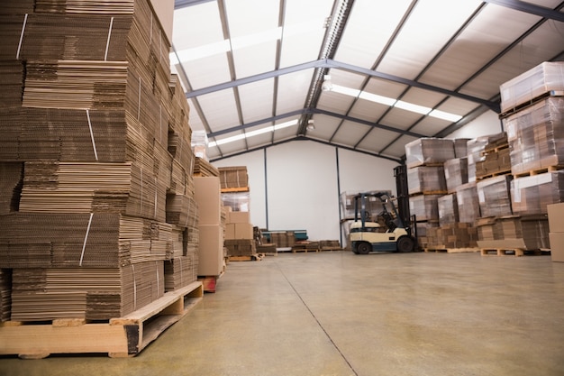 Forklift in a large warehouse