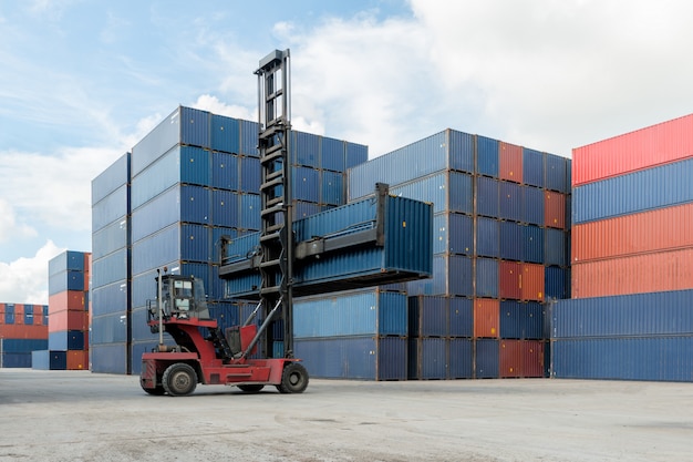 Forklift lifting container box loading to container depot use for cargo import, export, logistics