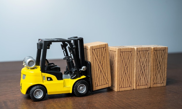 Forklift stacks wooden crates Transportation industry Transport department Warehousing and logistics concept