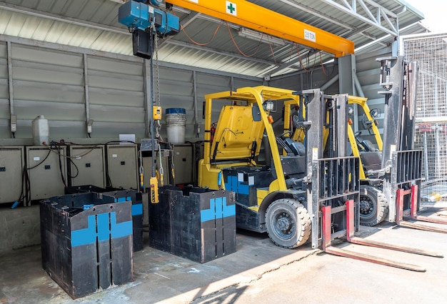 Forklifts parked to charge batteries