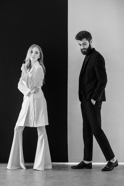 Photo formal couple of man in tuxedo and sexy woman bearded tuxedo man and woman always in style