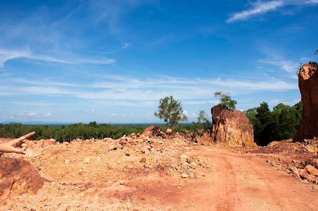 Formation canyon rocks originated from soil landscape and natural erosion of sandstone into various shapes and digging pit on ground in range mountain in forest for travel at Phatthalung Thailand