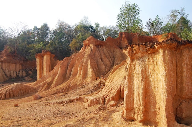 Photo formation pedestal mushroom rocks from erosion of sandstone of phae mueang phi forest park for thai people foreign travelers journey walk travel visit at phi pan nam range mountain in phrae thailand