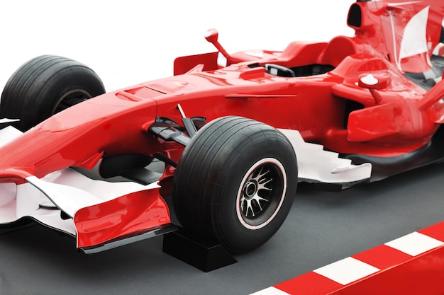 formel 1 one auto fast red  car isolated on white background in studio representing power and speed concept