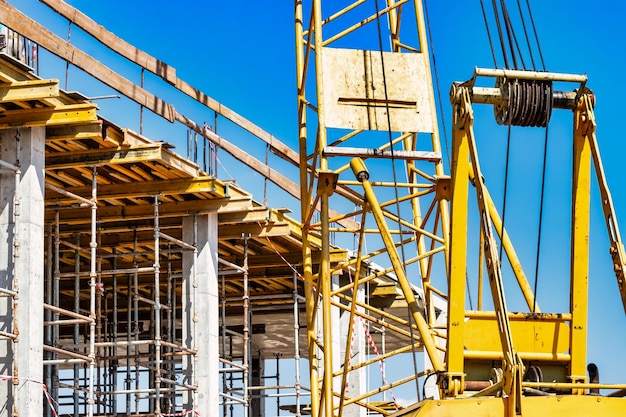 Formwork for pouring the second floor of a monolithic building Reinforcement of walls and ceiling Monolithic work during the construction of a building closeup Construction technologies