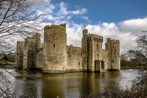 Fort by lake against sky