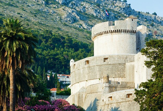 The fortress of Dubrovnik Old Town and the Minceta Tower with Croatian national flag.