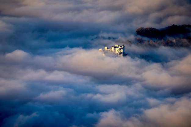 fortress hohensalzburg rising above a sea of clouds salzburg austria