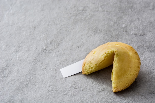 Fortune cookie on gray stone