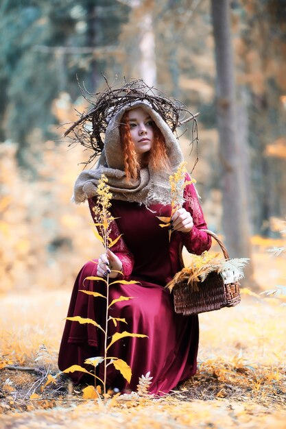 Fortune-teller conducts a ritual in the depths of the forest