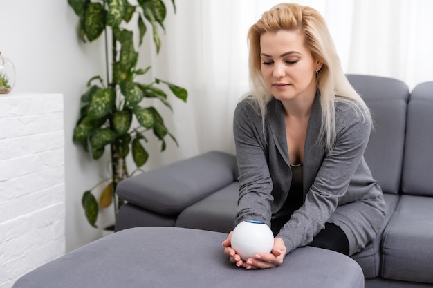 A fortune teller gazes into her ball.