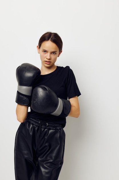 foto mooi meisje boksen zwarte handschoenen poseren sport Lifestyle ongewijzigd