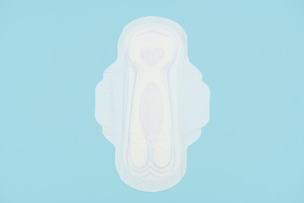 Foto&#39;s over het gezondheidsconcept van vrouwen, enkele aspecten van het welzijn van vrouwen in de periode van de maand. Menstruatiepad en tampon. Vrouw kritische dagen, gynaecologische menstruatiecyclus.