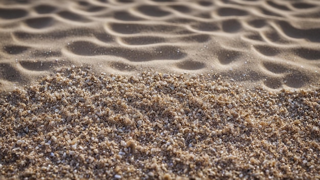 Foto van de textuur van het zand op het strand