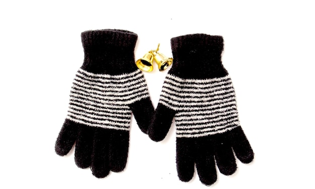 foto van een warme winter wollen handschoenen met xmas bel