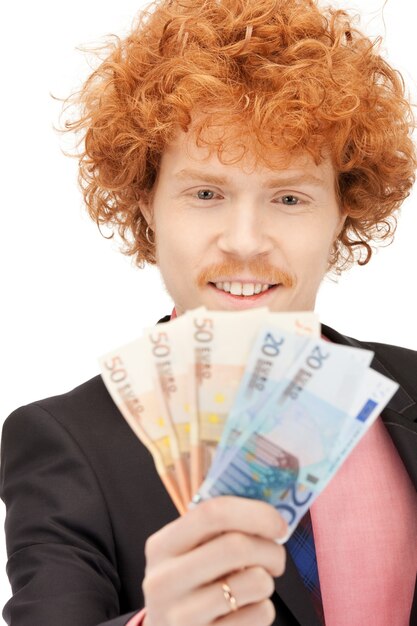 Foto foto van knappe man met euro contant geld