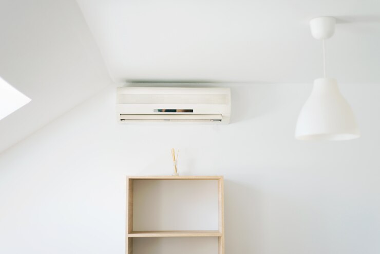 Foto van schone witte kamer met airconditioning, zomerdagen kunnen het koelst zijn.