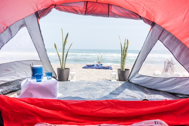 Fotoboek van een kamp op het strand in Peru