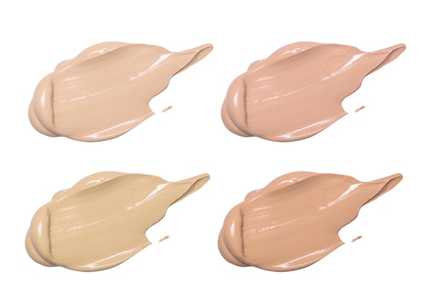 Foundation for face isolated on white Smears of tonal cream Set of multicolored swatches of makeup samples