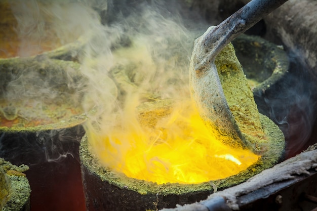 Foundry - molten metal poured from ladle