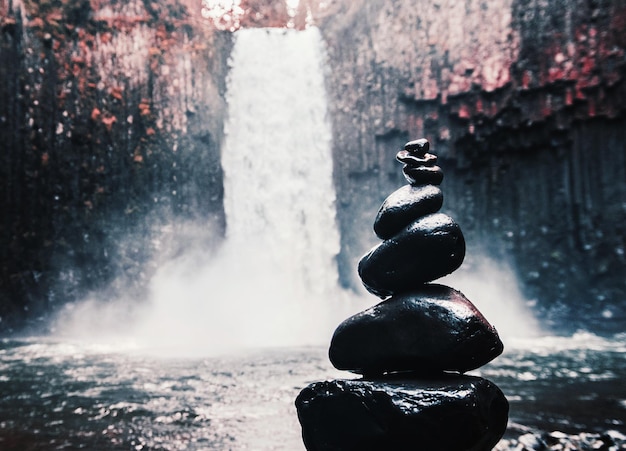 fountain against waterfall