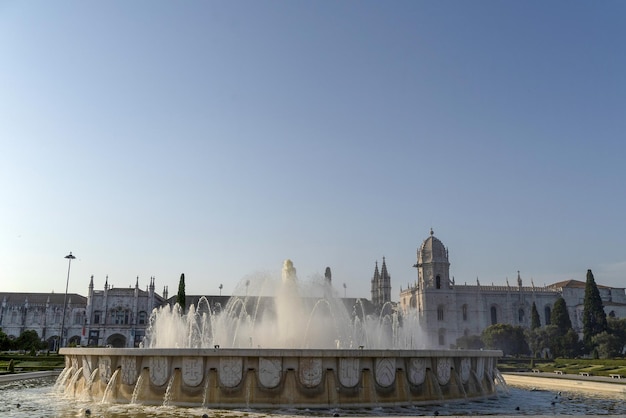 Fountain of lisbon jeronimos monastery at sunset