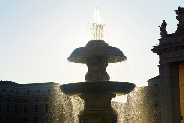 A fountain in St Peter's square Vatican city Rome Italy