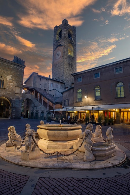 Fountain with tower in Piazza Vecchia in Bergamo