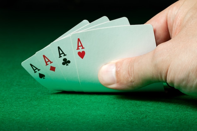 Four aces in male hand