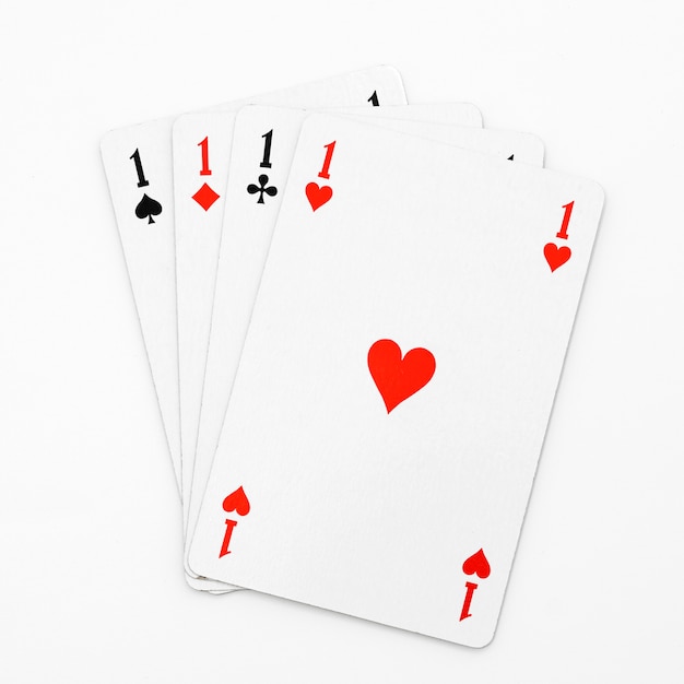 Four aces on white background