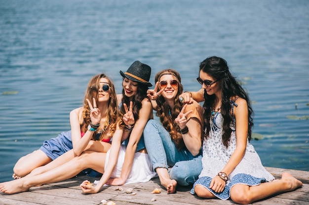 four beautiful girls on the beach