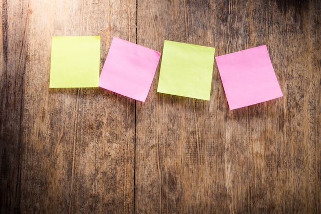 Four blank colorful sticky notes