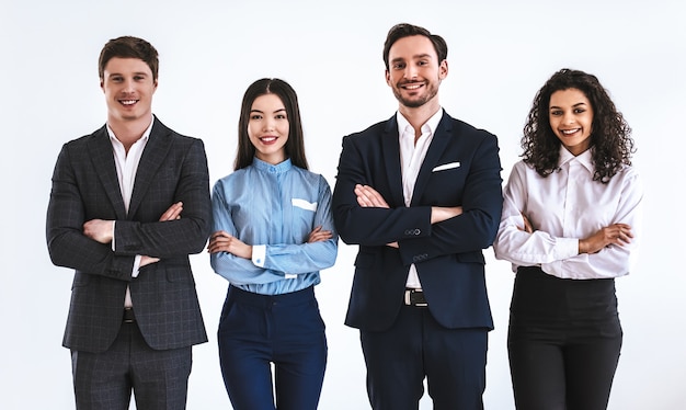 The four business people standing on the white background