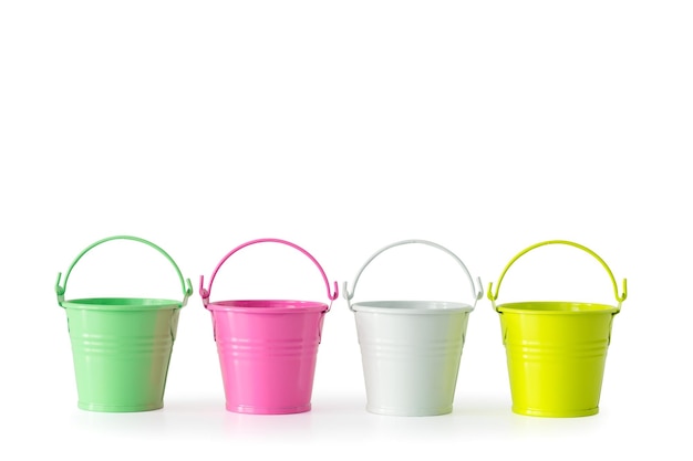 Four colorful buckets on white background