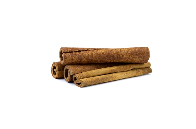 Four fragrant cinnamon sticks on a white background