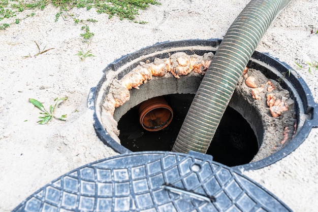 A four-inch suction pipe inserted into a home septic tank suction of household wastewater