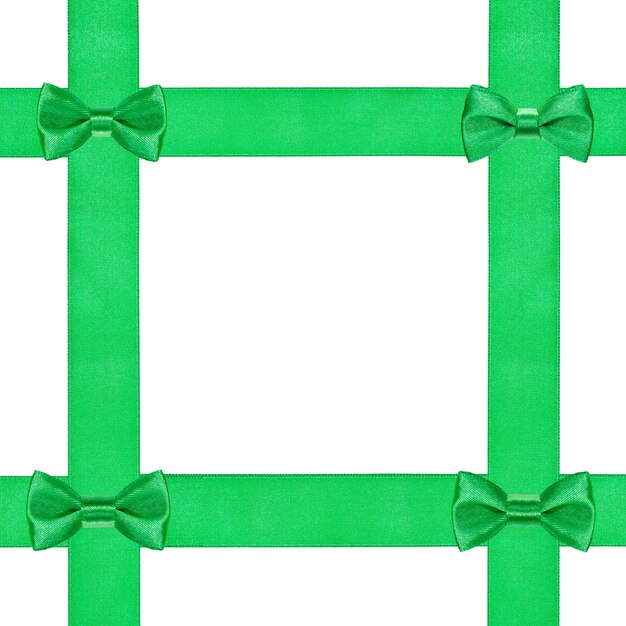 Four little green bow knots on four satin strips