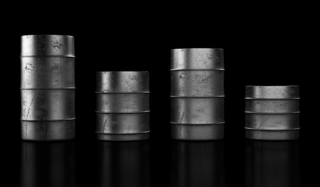 Four oil barrels on dark