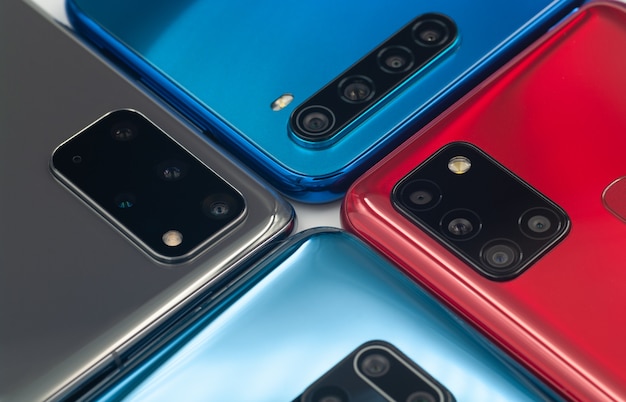 Four smartphones with different cameras