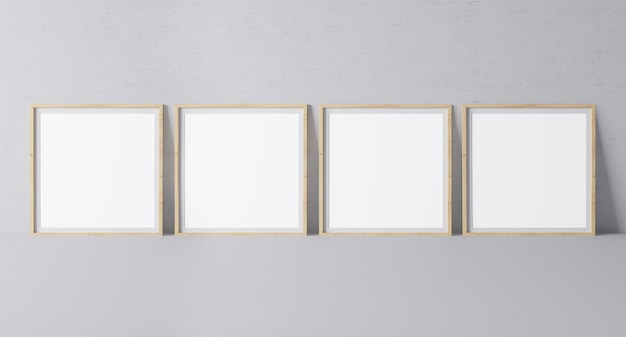 Four square wooden frames in modern design on minimal gray wall