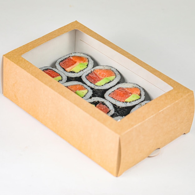 Four Sushi Rolls in Cardboard Box