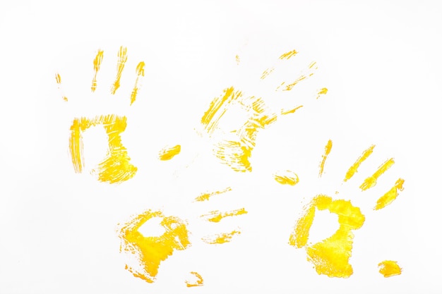 Four yellow handprints